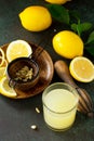 Cold drink with freshly squeezed lemon juice and fresh lemons Royalty Free Stock Photo