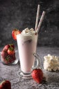 a cold drink. milk strawberry milkshake