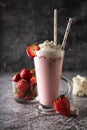 a cold drink. milk strawberry milkshake