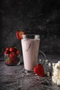 a cold drink. milk strawberry milkshake