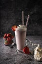 a cold drink. milk strawberry milkshake