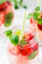 Cold drink with watermelon, strawberry, balm mint. Close up