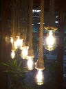 Cold-electric bulbs on a knitted string in retro style like luminaries