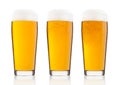 Cold glasses of lager beer with foam and dew Royalty Free Stock Photo