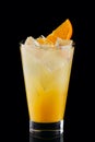 Cold fizz cocktail with orange isolated on black Royalty Free Stock Photo