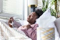 Cold And Flu. Portrait Of Ill black Woman Caught Cold, Feeling Sick havinh fever. Closeup Of Beautiful Unhealthy Girl Covered In Royalty Free Stock Photo