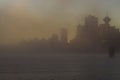 Foggy sunrise at Canada place and the harbour centre tower in Vancouver, Canada