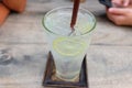 Cold and Fresh Lemon soda juice on wooden table Royalty Free Stock Photo