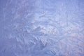 Cold frost patterns on glass Royalty Free Stock Photo