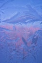 Cold frost patterns on glass Royalty Free Stock Photo