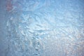 Cold frost patterns on glass Royalty Free Stock Photo