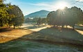 cold frosty early morning on golf course in the mountains Royalty Free Stock Photo