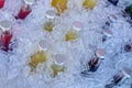 Cold glass beverages in heap of ice Royalty Free Stock Photo