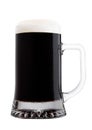 Cold glass of dark beer with foam and dew Royalty Free Stock Photo