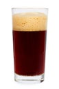 Cold glass of dark beer or kvass with foam isolated on white background. Royalty Free Stock Photo