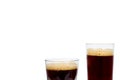 Cold glass of dark beer or kvass with foam isolated on white background, copy space template. Royalty Free Stock Photo