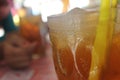 Cold glass of iced tea with a mixture of sugar Royalty Free Stock Photo