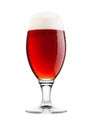 Cold glass of red bitter beer with foam and dew Royalty Free Stock Photo