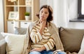 Unhappy sick woman with sore throat at home Royalty Free Stock Photo