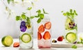 Cold Infused detox water with edible flowers, strawberry and mint leaves. Refreshing summer drink Royalty Free Stock Photo