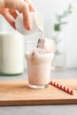 Cold latte is made from coffee ice cubes and milk