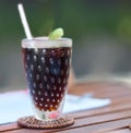 Cold Lemon black tea in tall glass on table Royalty Free Stock Photo