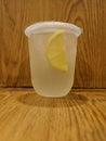 cold lemon drink on wooden table Royalty Free Stock Photo