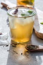 Cold Lemon green tea in glass with anise ice. Heathy summer probiotic drink