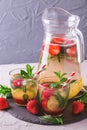 Cold lemonade with fresh strawberry, mint, lime and jam Royalty Free Stock Photo