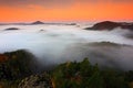 Cold misty foggy morning in a fall valley of Bohemian Switzerland park. Hills with fog, landscape of Czech Republic, National Par Royalty Free Stock Photo