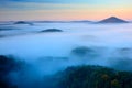 Cold misty foggy morning in a fall valley of Bohemian Switzerland park. Hills with fog, landscape of Czech Republic Royalty Free Stock Photo