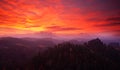 Cold misty morning sunrise in a fall valley of Bohemian Switzerland park. Hill with view hut on hill increased from magical Royalty Free Stock Photo