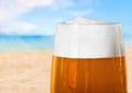 Mug of cold beer on background Royalty Free Stock Photo