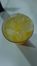 cold orange flavored drink from squeezed