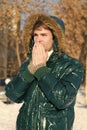 It is cold outside. Forest in snow. Fresh air. Snowy weather. Trendy winter coat. man on winter holidays. Vacation and