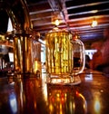 Cold pint of beer on a bar Royalty Free Stock Photo