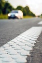 Cold plastic structured stripes with dot pattern for road surface marking Royalty Free Stock Photo