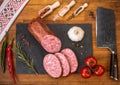 Cold platter of traditional sausage on wooden table