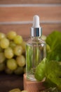 Cold pressed grape oil. Organic bio care products with natural ingredients. Close-up grapes and copy space. Halved grapes and grap