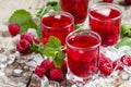 Cold Raspberry drink with mint and ice, selective focus Royalty Free Stock Photo