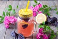 Cold and refreshing citrus fruit lemonade in mason jars