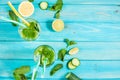 Cold and refreshing infused detox water with lime, mint and cucumber in a glass on wood background Royalty Free Stock Photo