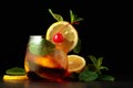 Cold refreshing summer cocktail Cuba libre with lemon slices, cherry, and mint