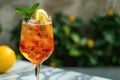 Cold refreshing summer drink with ice, lemon, and mint on marble table Royalty Free Stock Photo