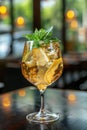 Cold refreshing summer drink with ice, lemon, and mint on marble table Royalty Free Stock Photo