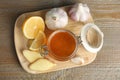 Cold remedies on wooden table. Sore throat treatment Royalty Free Stock Photo