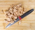 cold roast pork chopped on a wooden board with a sharp knife Royalty Free Stock Photo