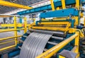 Cold rolled steel coil on decoiler of machine in metalwork manufacturing