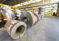 Cold rolled steel coils in storage area ready to feed to machine Royalty Free Stock Photo