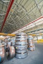 Cold rolled steel coils in storage area ready to feed to machine Royalty Free Stock Photo